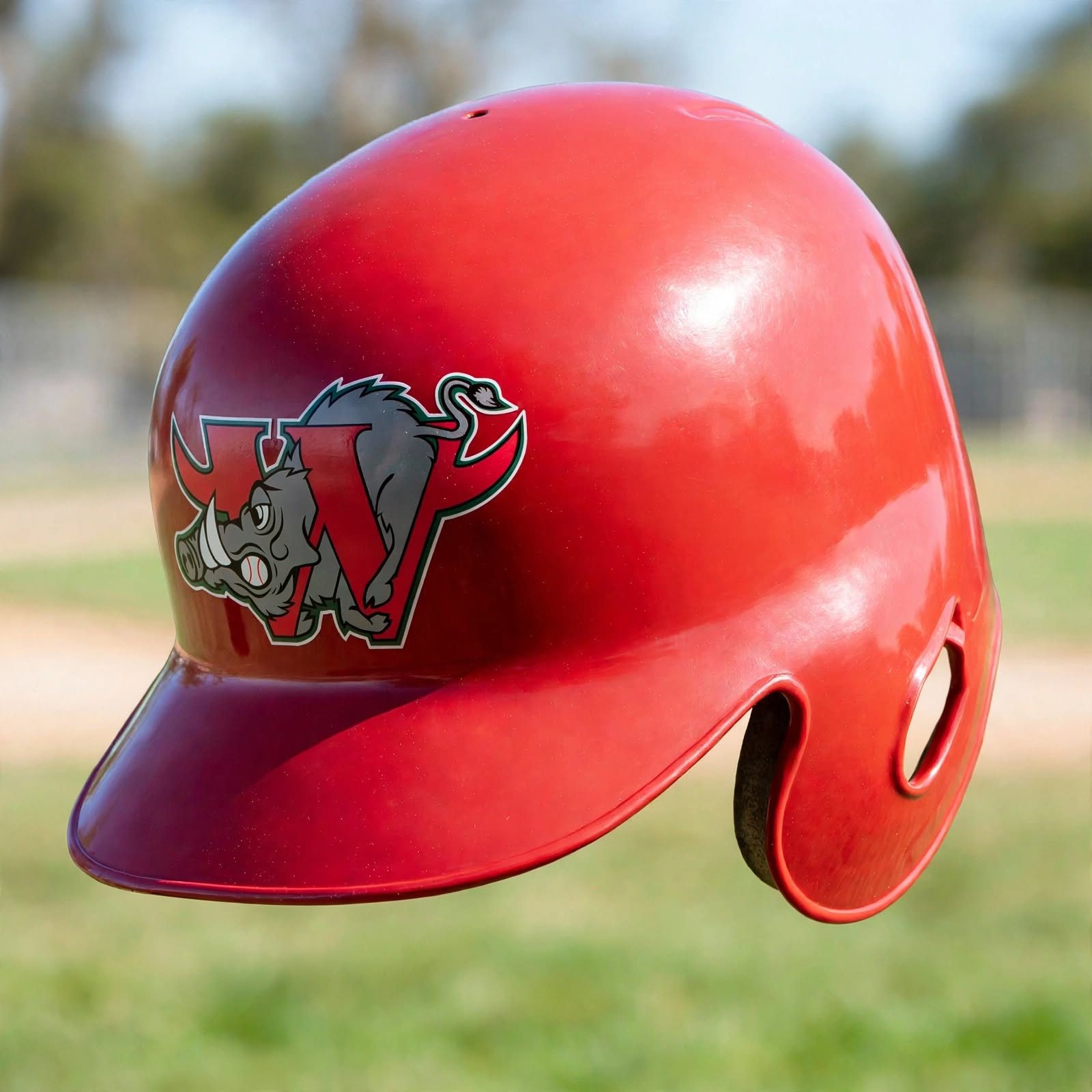 Red custom baseball spirit helmet with rhino mascot decal